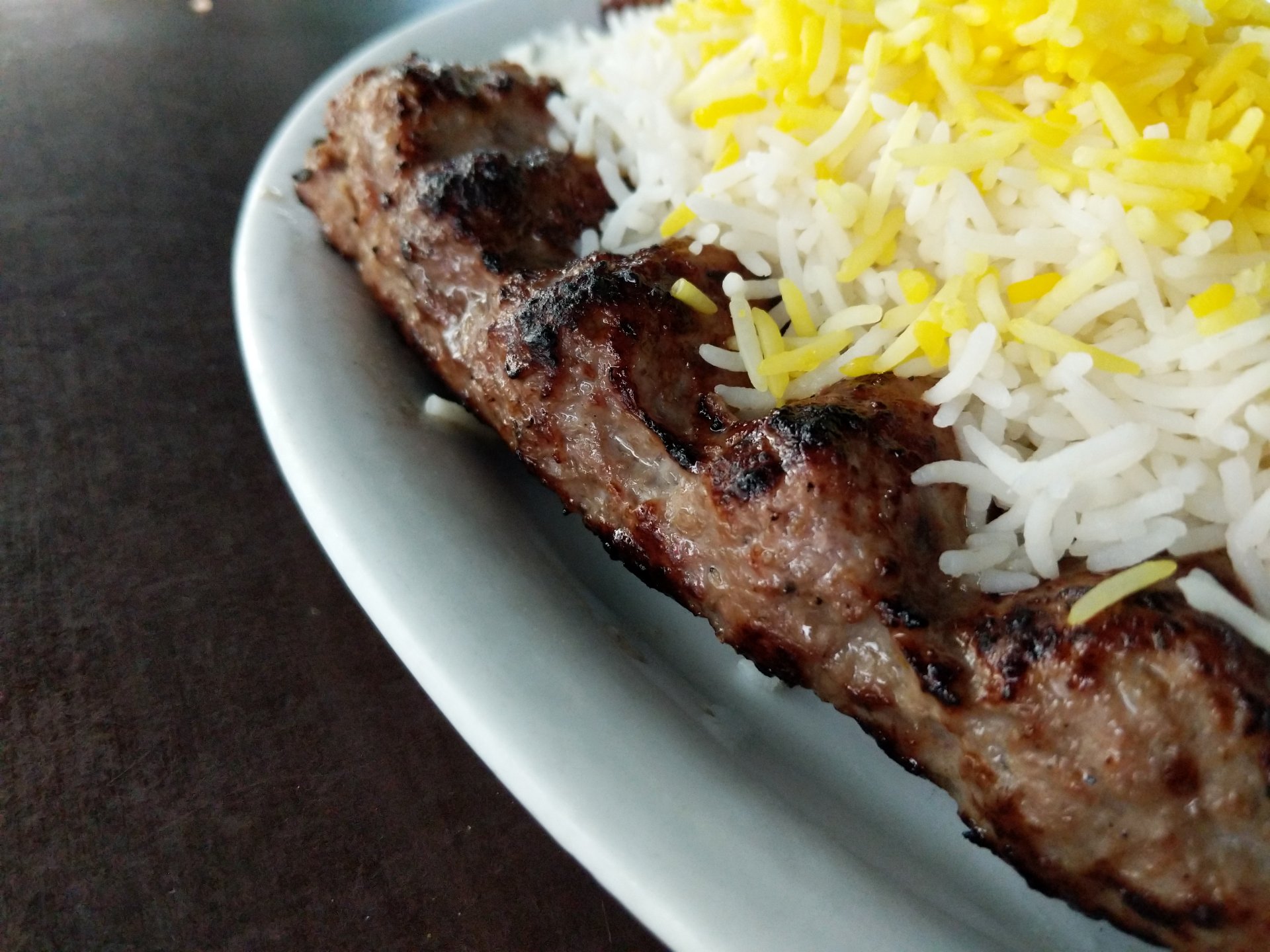 Close up of kebab kubideh and rice