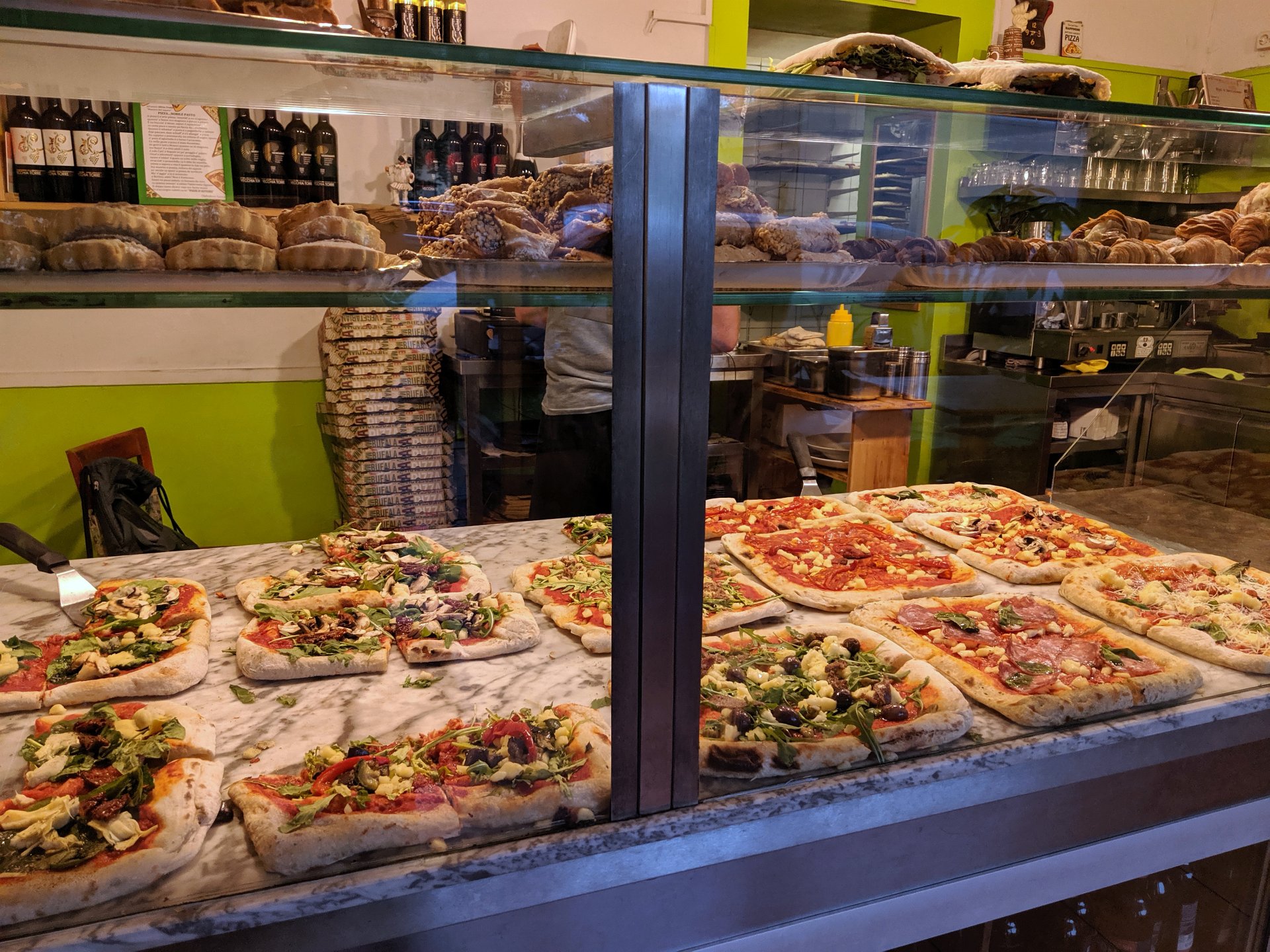 Another shot of the counter and pizza selection