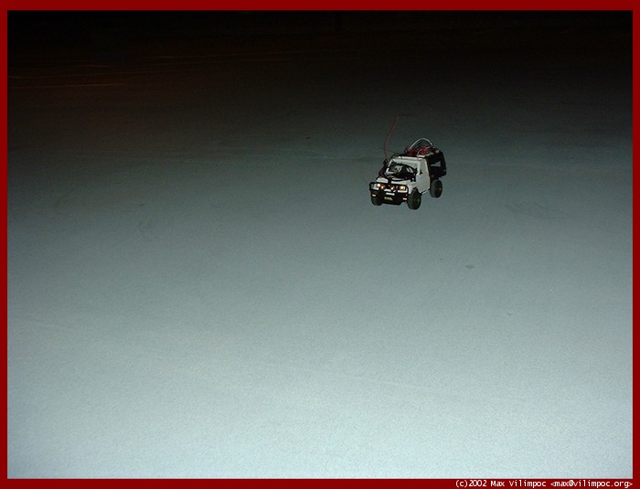The remote control car driving on the parking garage roof