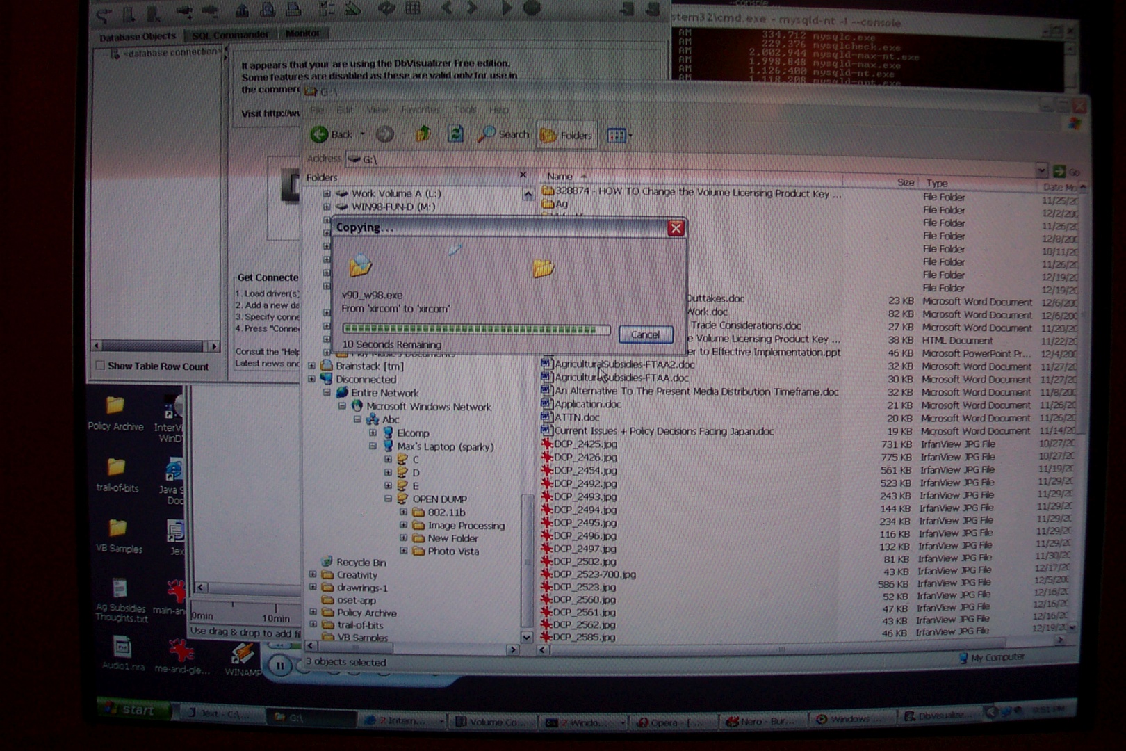A screenshot of Windows Explorer on Windows XP copying files from a laptop