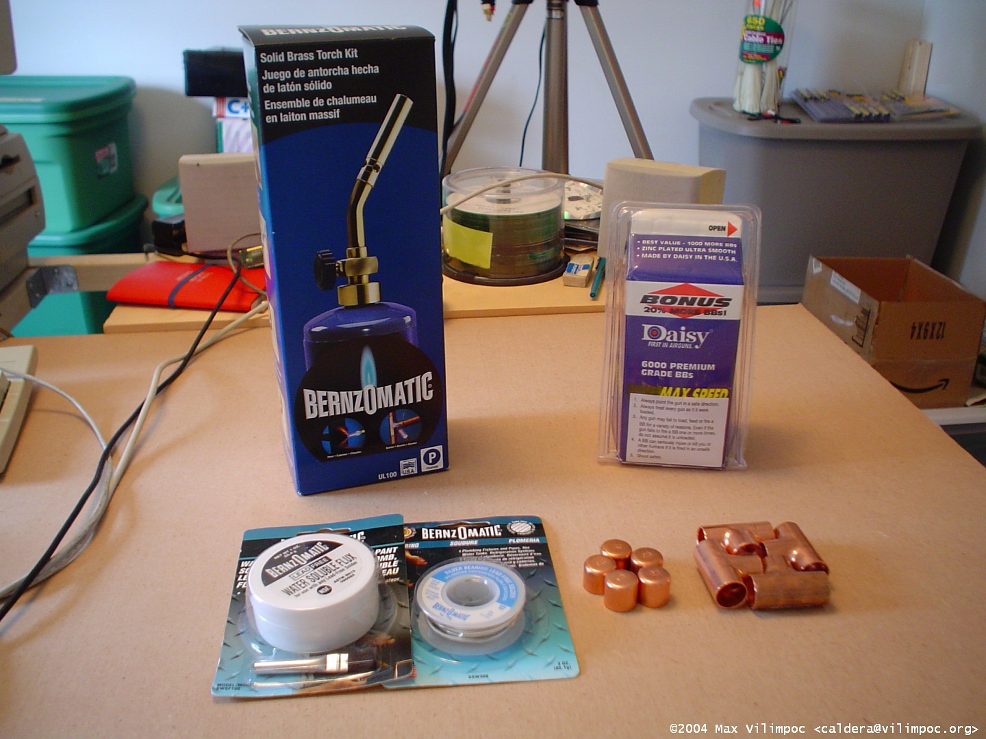 A Bernzomatic propane torch, solder flux, solder, and copper joints and endcaps
