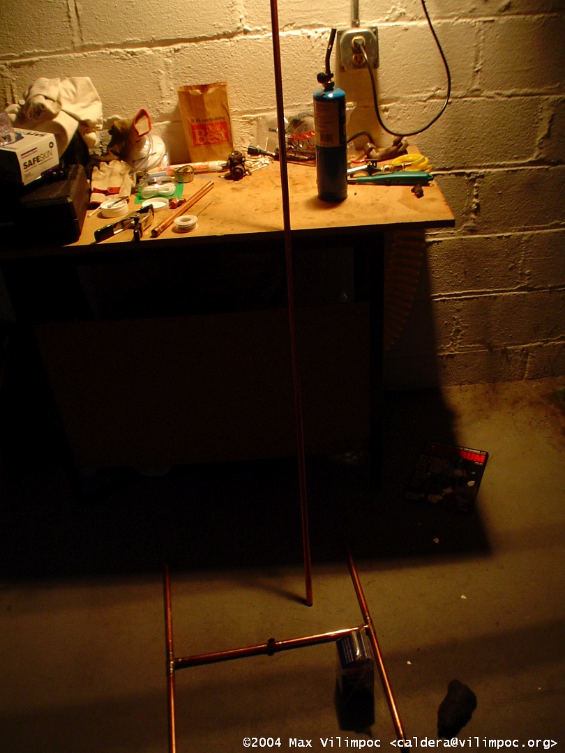 One long piece of copper tubing which will plug into the base and point directly vertical into the air