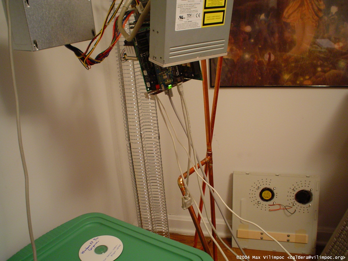 A close up view of the hanging computer's CD-ROM drive